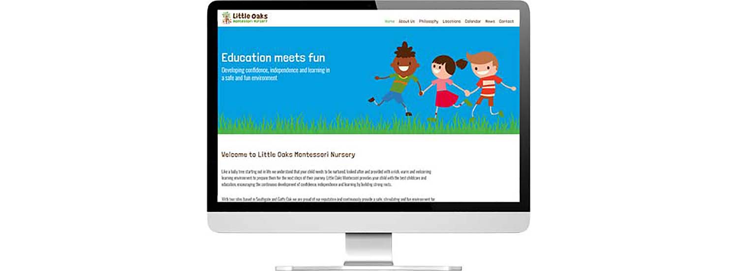 Website design and development showing on large computer screen